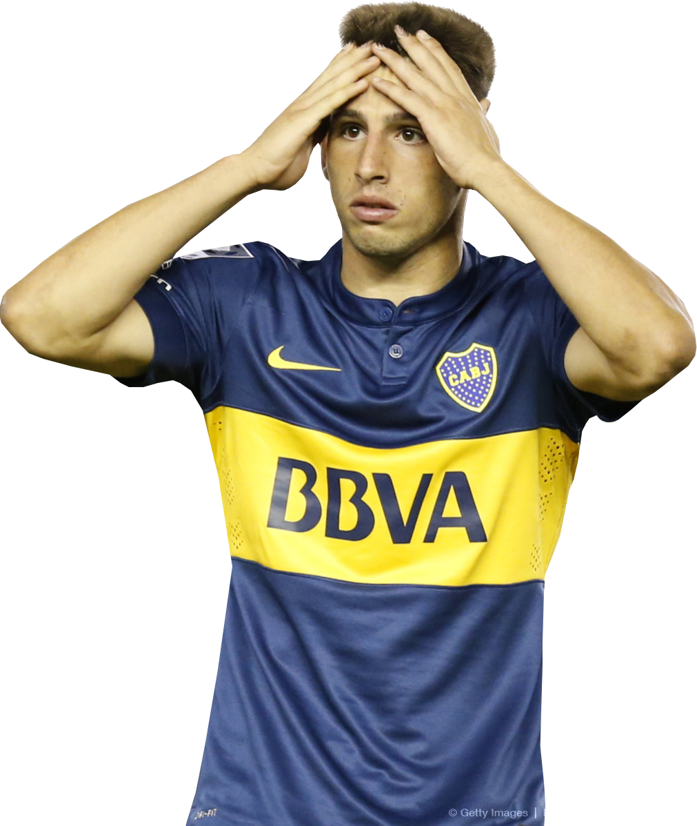 Jonathan Calleri of Boca Juniors, center, heads the ball during a